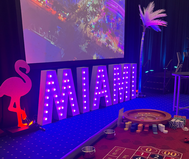 Miami Vice theme night Decorations rental. Miami Style Casino Party Featuring Large Neon Letters, Glamorous Lights, Tropical Vibes, Luxury Decor, and High Energy Entertainment for an Unforgettable Night of Celebration and Style and Exclusive Miami Experience styles themed parties & events. North Vancouver, West Vancouver, Burnaby, Port Moody, Coquitlam, Port Coquitlam, Surrey, Langley, Kelowna, Richmond, Delta, Kamloops, Mission. Chilliwack, Abbotsford, Tsawwassen, Whistler, Squamish...